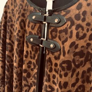 Chicos worn once! Leopard w leather trim cape/poncho! Sophisticated design,style